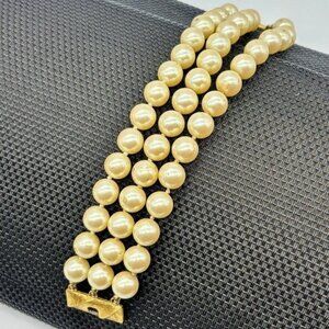 Vintage Monet Three Strand, Faux Pearl Bracelet, Gold Tone Clasp, Marked "Monet"